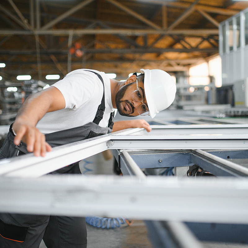 PVC industry worker or operator making frames for windows and doors